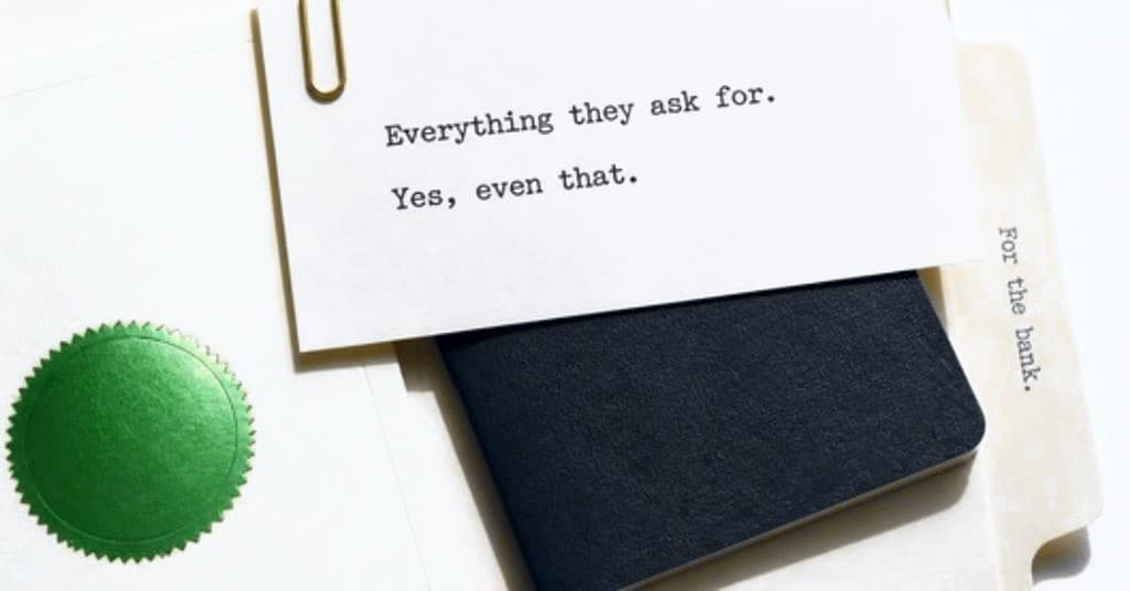 A cream folder marked For the bank: a passport, the certificate with our green seal, and a note clipped on top: Everything they ask for. Yes, even that.